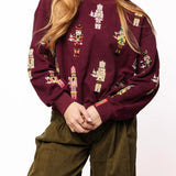 Plum Cocktail Serving Nutcracker Sweatshirt